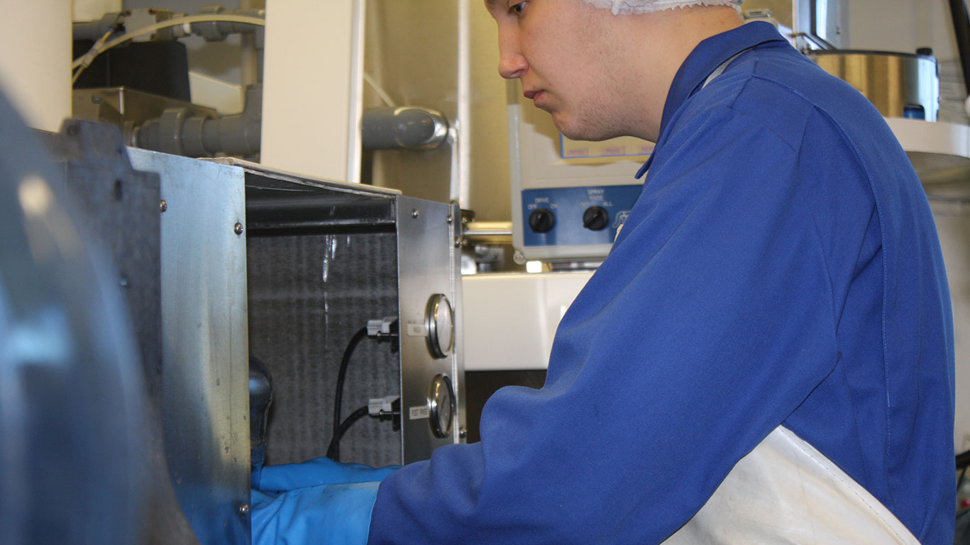 Connor Dixon working in water bottling plant