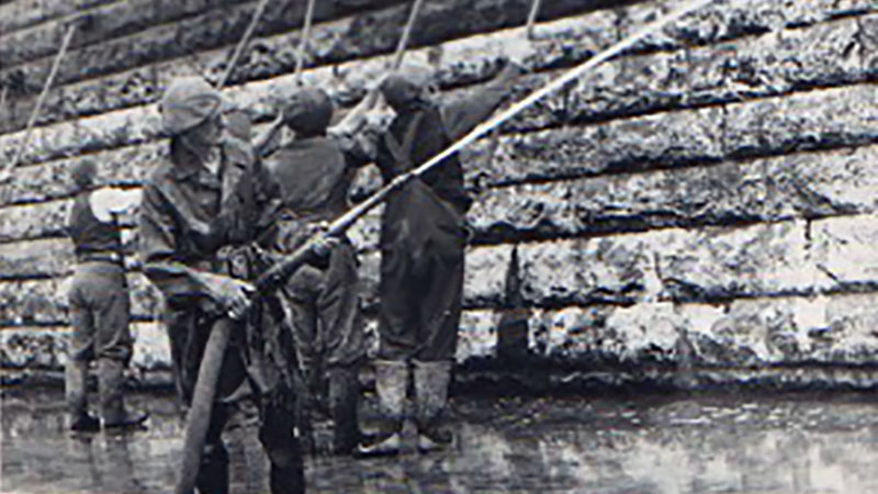 water workers cleaning seaton spring reservoir